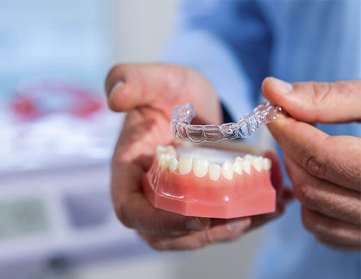 Norwalk Dental Care | Blanqueamiento Profundo KOR  , Parciales y Dentaduras and Puentes Dentales